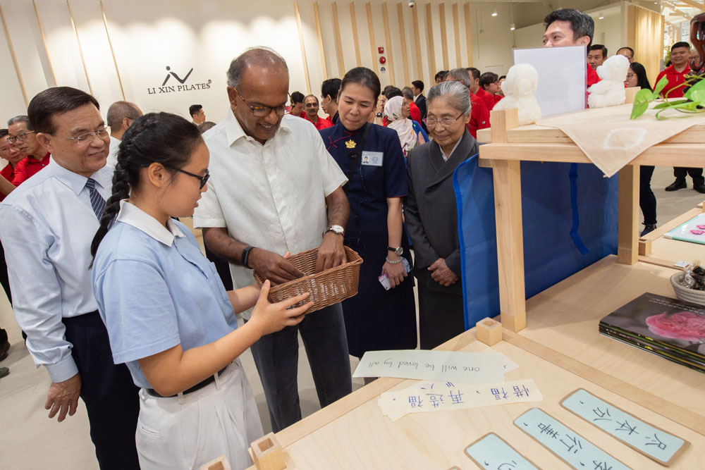Minister for Home Affairs and Law, Mr K. Shanmugam (3rd from the left), visiting a booth at the launch and open day of the Youth Centre  (Photo by Alvin Tan)